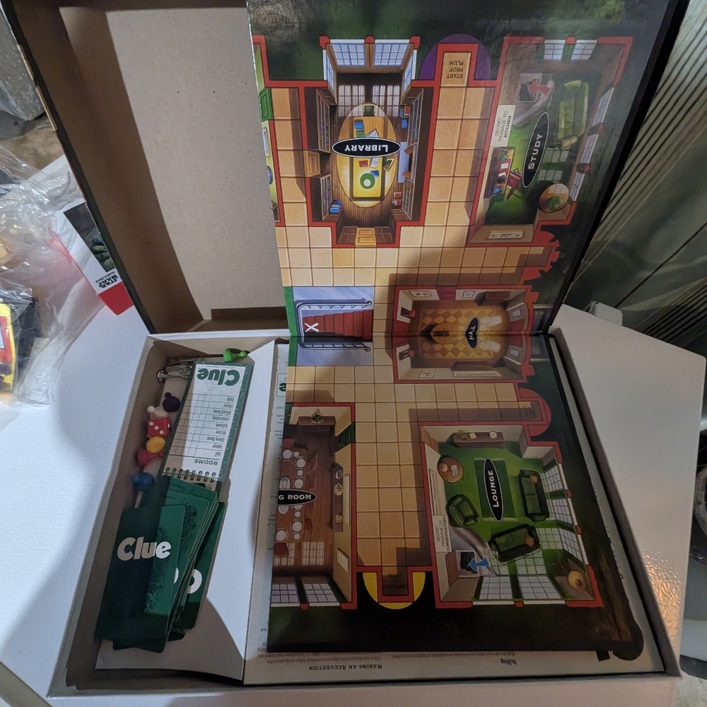 Clue Mystery Board Game with Colorful Pieces